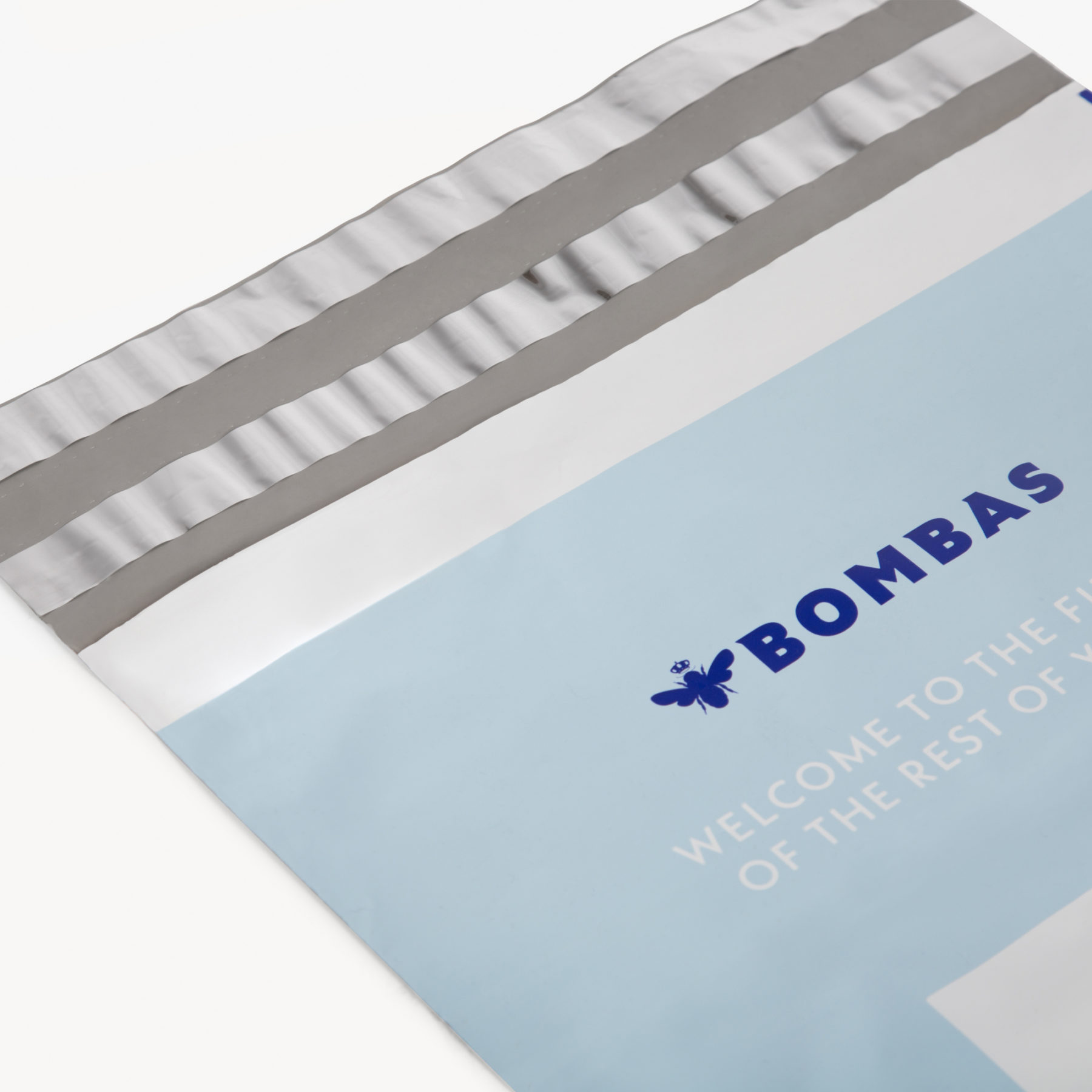 Bombas uses Lumi to produce Poly Mailers with tear strips and adhesive strips for easy returns. Watch our full unboxing video. Packaging Strategies for Efficient Returns