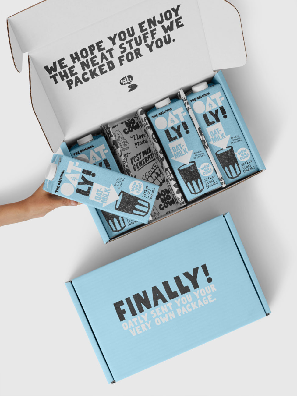 Custom roll end tuck front corrugated mailer box for Oatly with roll end base, cherry locks, dust flaps, tuck front lid. Flexography on mottled white liner.