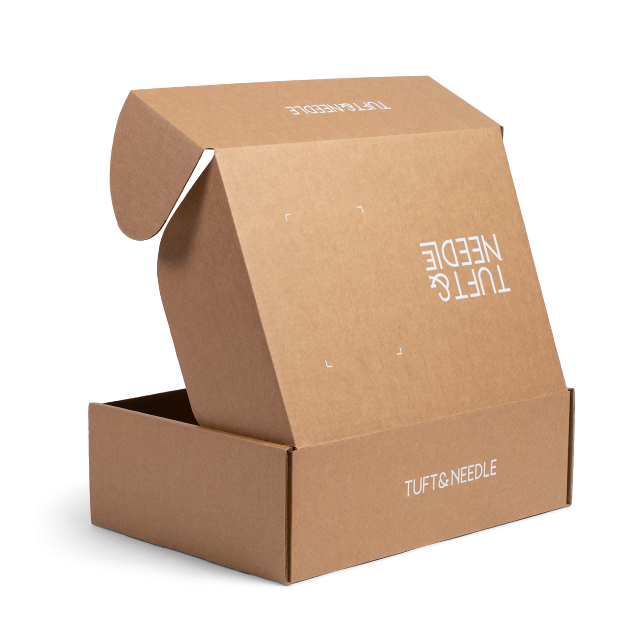 Custom roll end tuck front corrugated mailer box for Tuft &amp; Needle with roll end base, cherry locks, dust flaps, tuck front lid. Flexography on natural kraft liner.